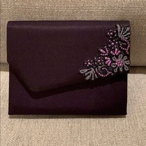 Deep eggplant clutch